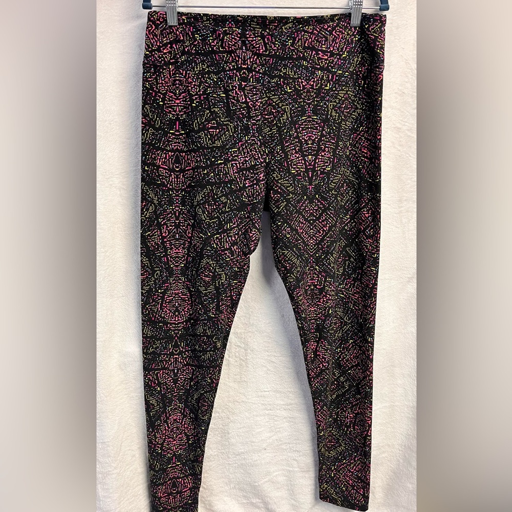 LuLaRoe Black Leggings with Pink, Yellow and Blue Pattern